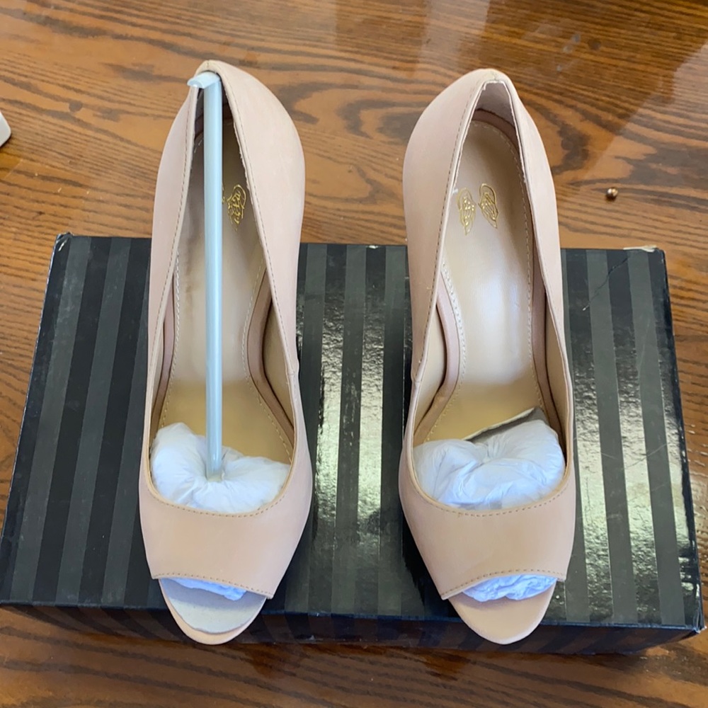 New, in-box, Victoria’s Secret nude peep-toe heel